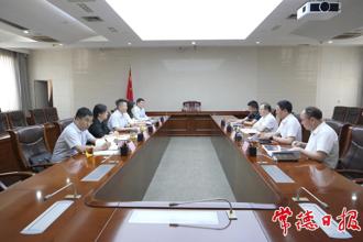 周振宇與廣發(fā)銀行長沙分行董朝紅一行座談